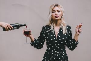Manager Drinking Wine and smoking